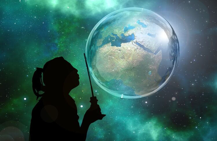 Silhouette of girl holding wand against bubble Earth