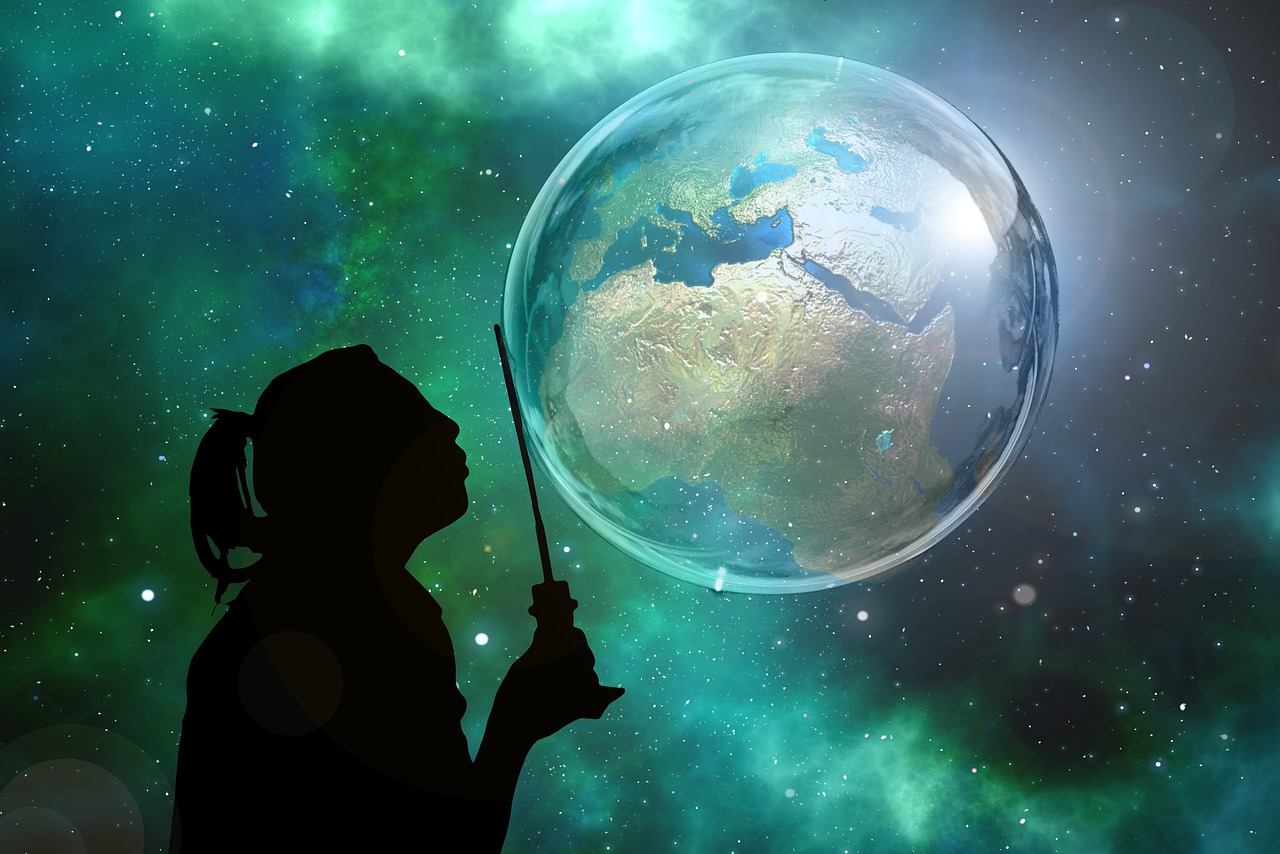 Silhouette of girl holding wand against bubble Earth